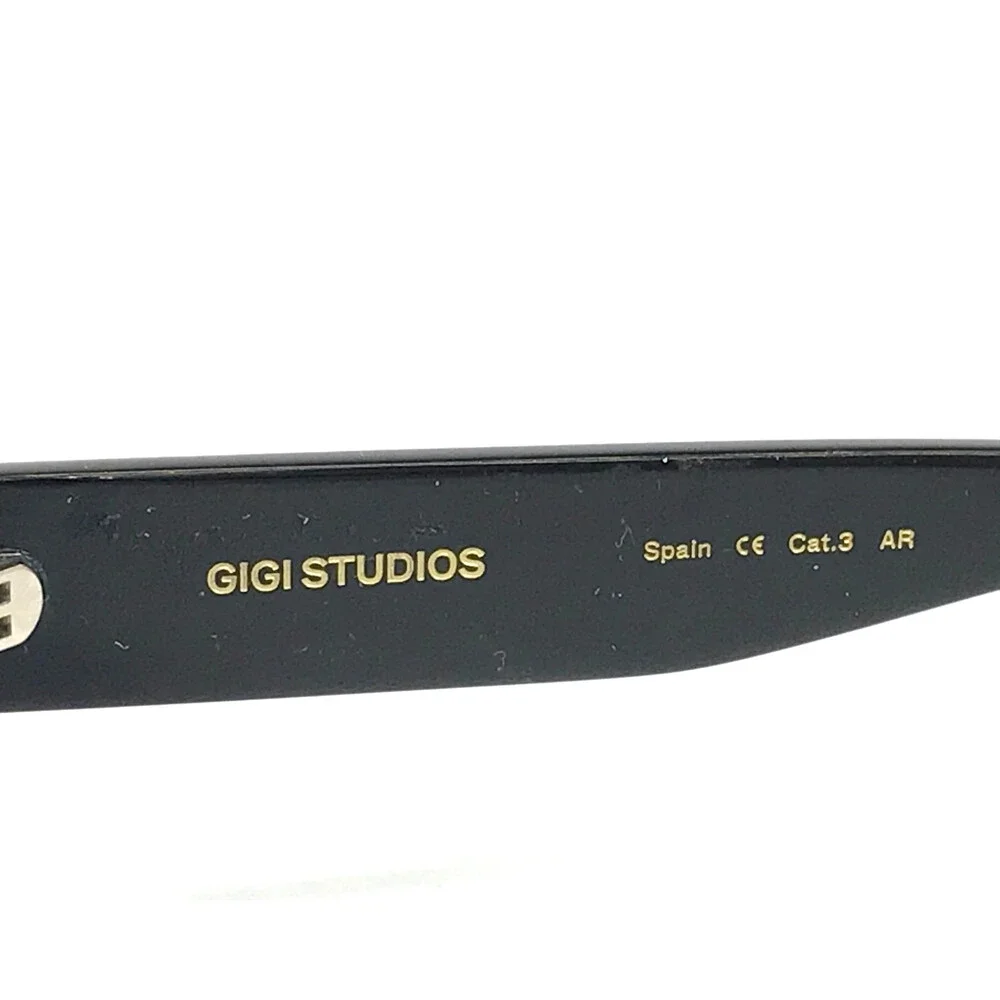 Gigi Studios Sunglasses CITRUS 6944/1 Black Geometric Frames with Gray Lenses
